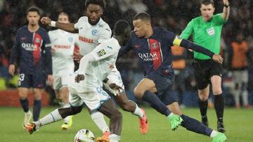 Kylian Mbappe (right) came off the bench but could not inspire a title-winning victory for PSG. (EPA PHOTO)