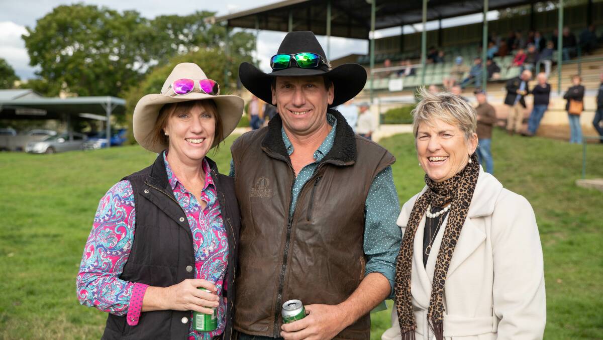 Gundagai's Melinda Elliott and her sister Ange Anderson visiting from Coffs Harbour at the Gundagai Cup for their mother's memorial race, with Melinda's husband Anthony. 