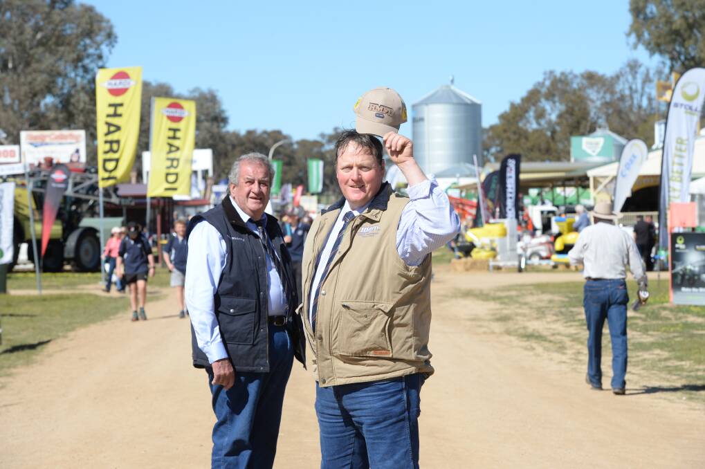 Former Henty Machinery Field Days chairman, Ross Edwards, and current chairman, Nigel Scheetz. File picture